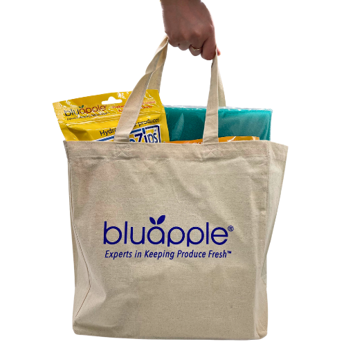 Bluapple canvas bag filled with Bluapple products being carried