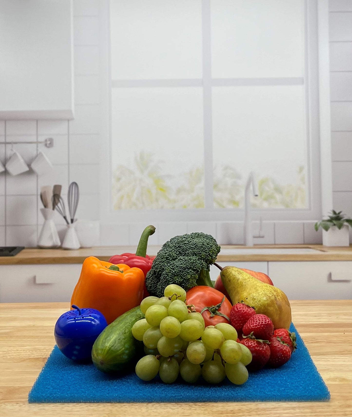 Produce on Blue FreshMat in kitchen with Bluapple