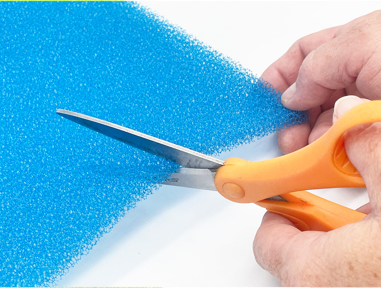 Scissors cutting blue FreshMat