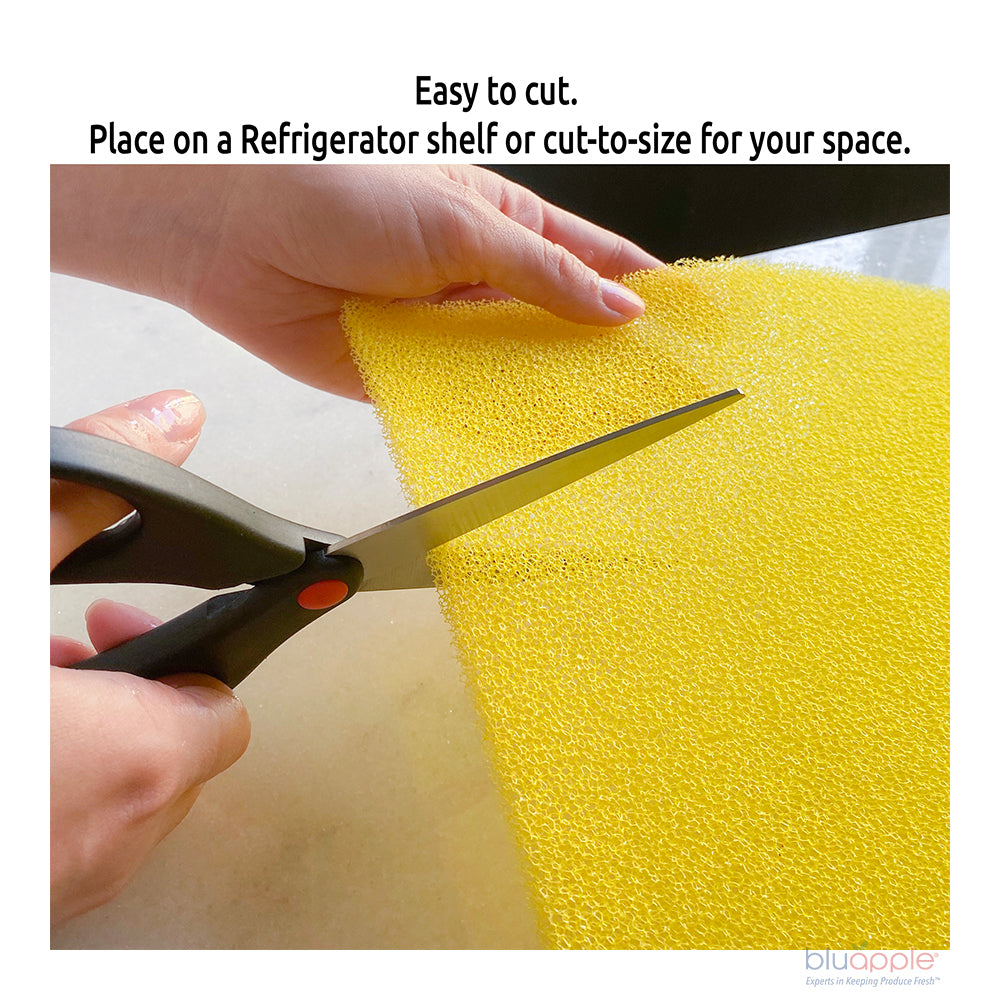 Yellow freshmat being cut with scissors