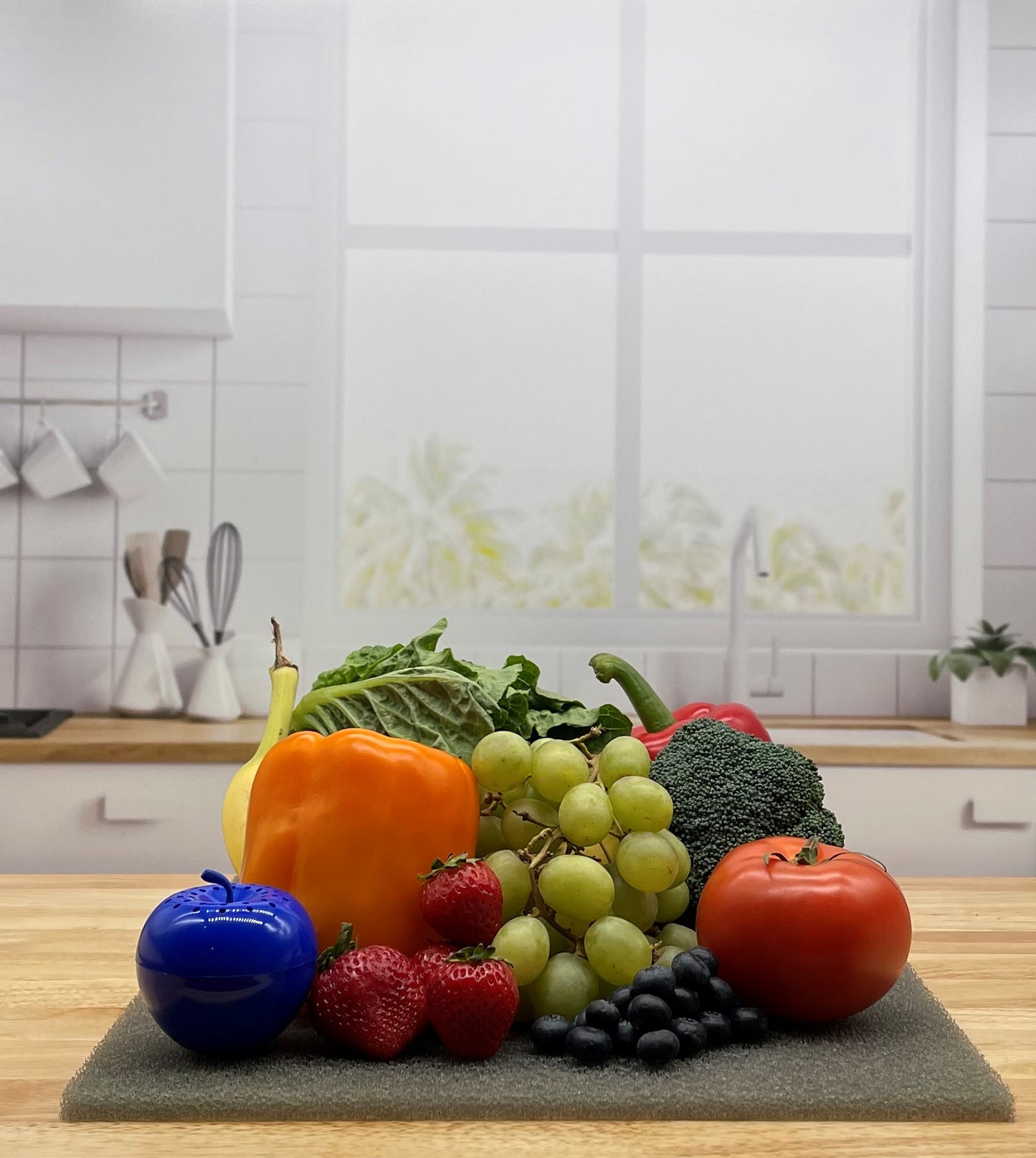 Produce on Gray FreshMat in kitchen with Bluapple