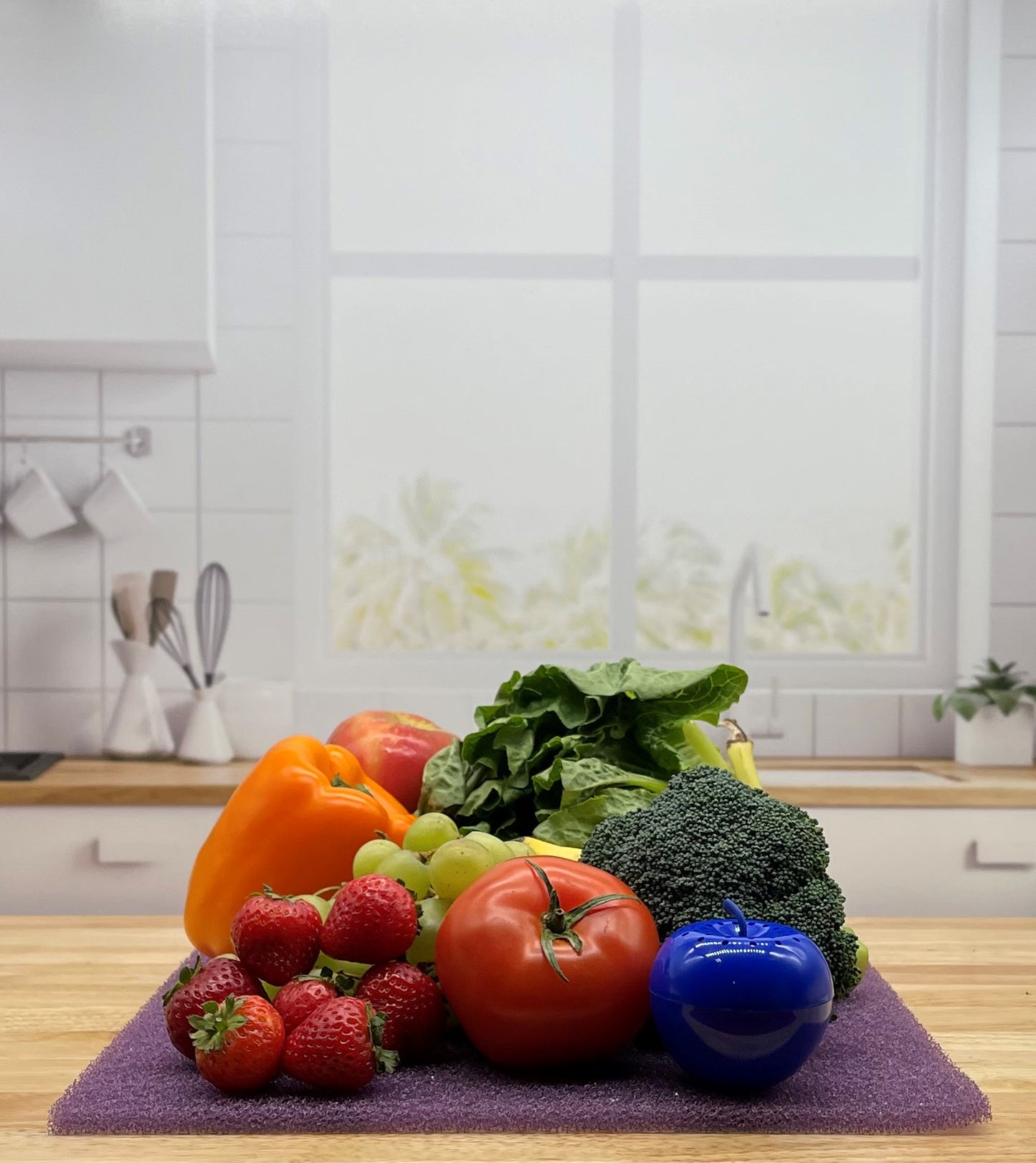 Produce on Purple FreshMat in kitchen with Bluapple